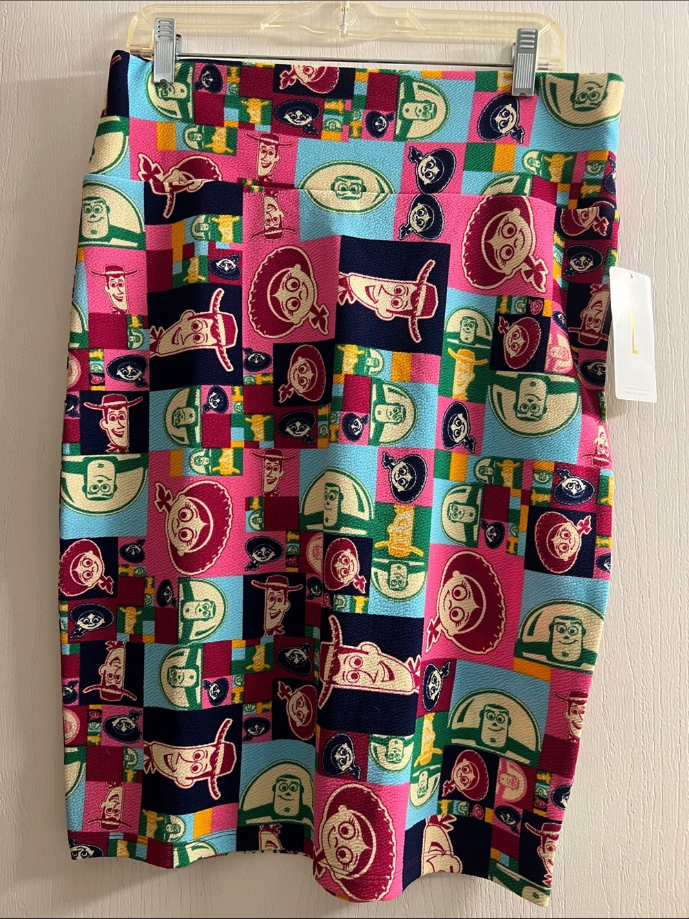 LuLaRoe Pink Green Navy Yellow Cartoon Face Skirt